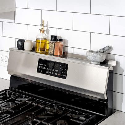 A magnetic stove shelf to make a place for your most-used seasonings.
