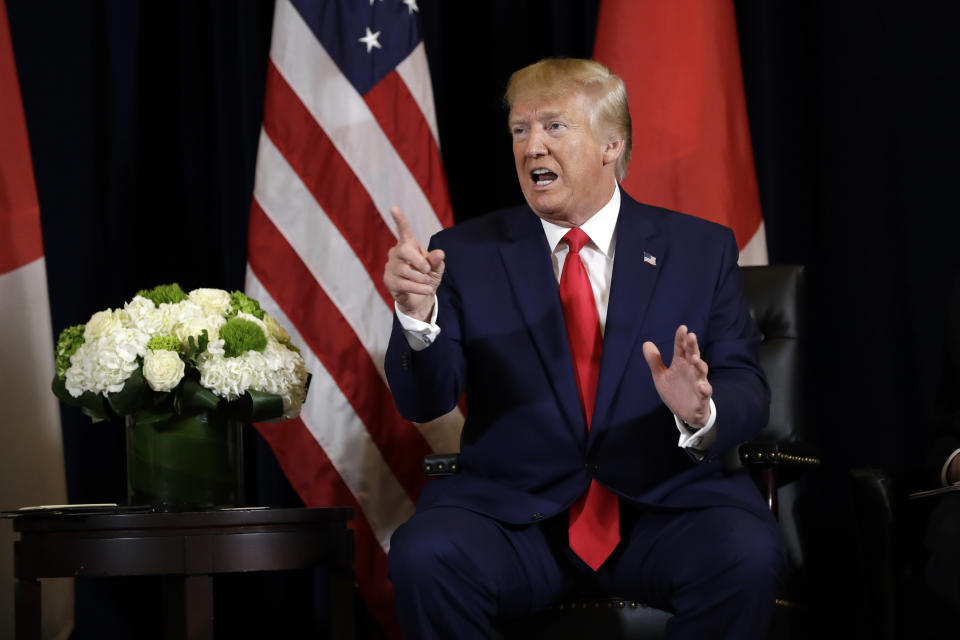 President Donald Trump talks while meeting with Japanese Prime Minister Shinzo Abe at the InterContinental Barclay New York hotel during the United Nations General Assembly, Wednesday, Sept. 25, 2019, in New York. (AP Photo/Evan Vucci)