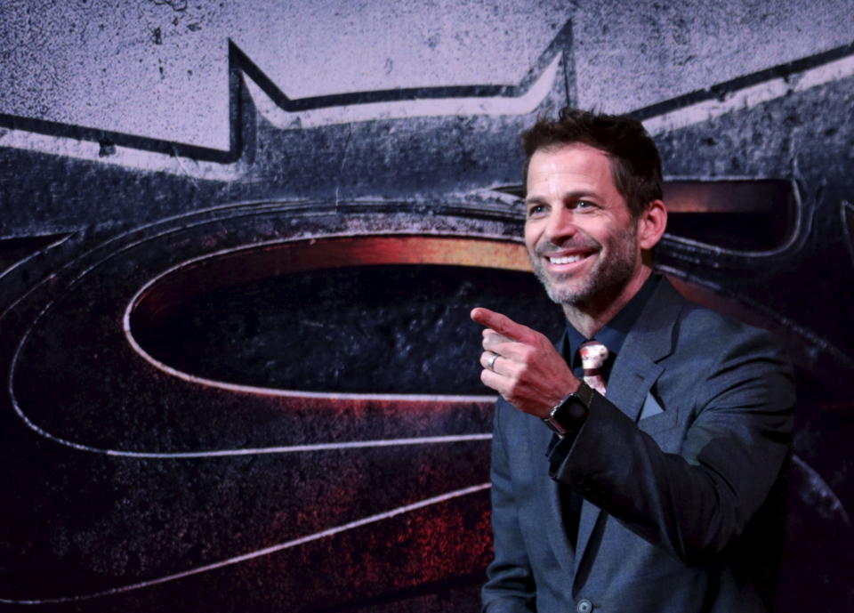 Director Zack Snyder poses as he arrives on the red carpet for the screening of the movie 