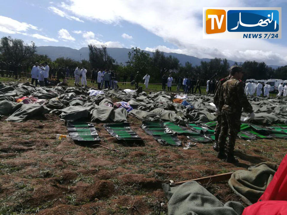 <p>Bodies of victims are covered with blankets after Algerian military plane crashed near an airport outside the capital Algiers, Algeria April 11, 2018 in this still image taken from a video. (Photo: ENNAHAR TV/Handout/ via Reuters) </p>