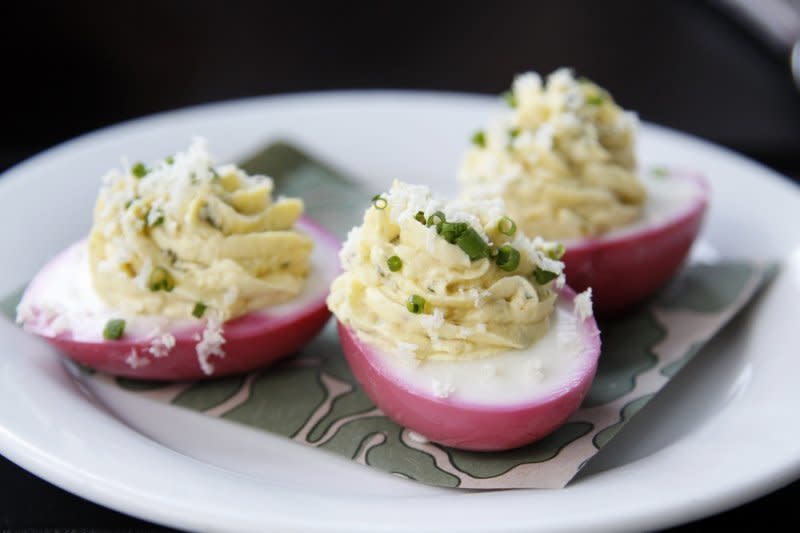 <strong>Get the <a href="http://www.bellalimento.com/2012/07/26/beet-pickled-eggs-for-1000-cooks-for-the-cure/" target="_blank">Beet Pickled Deviled Eggs from Bell'Alimento</a></strong>