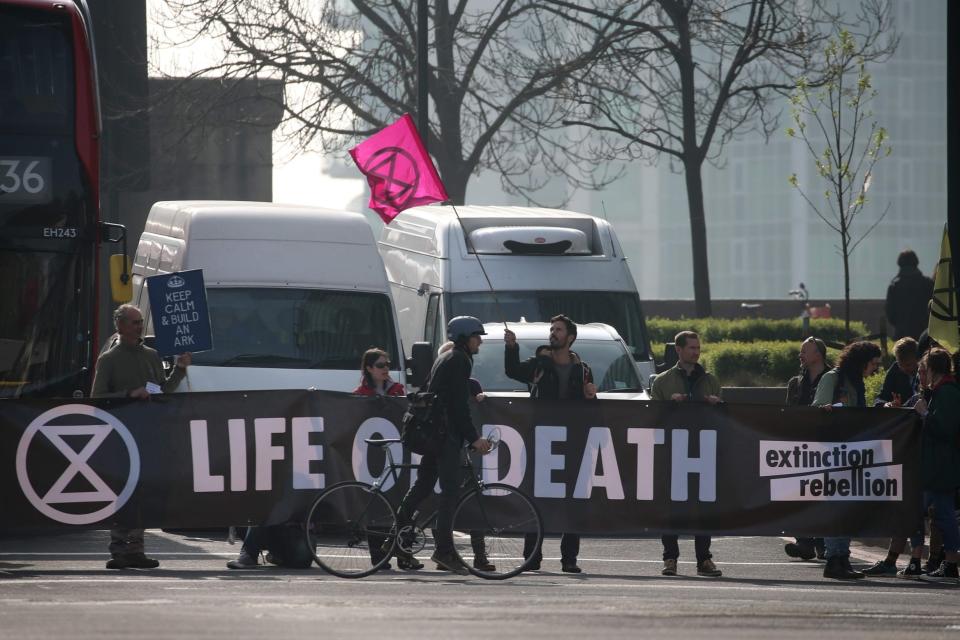 A group of protesters on Vauxhall Bridge, where they held up traffic (AFP/Getty Images)