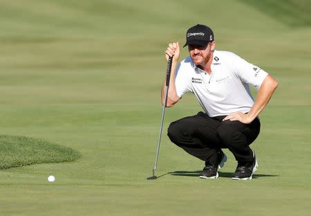 Jul 28, 2016; Springfield, NJ, USA; PGA golfer Jimmy Walker lines up a putt on the tenth hole during the first round of the 2016 PGA Championship golf tournament at Baltusrol GC - Lower Course. Brian Spurlock-USA TODAY Sports