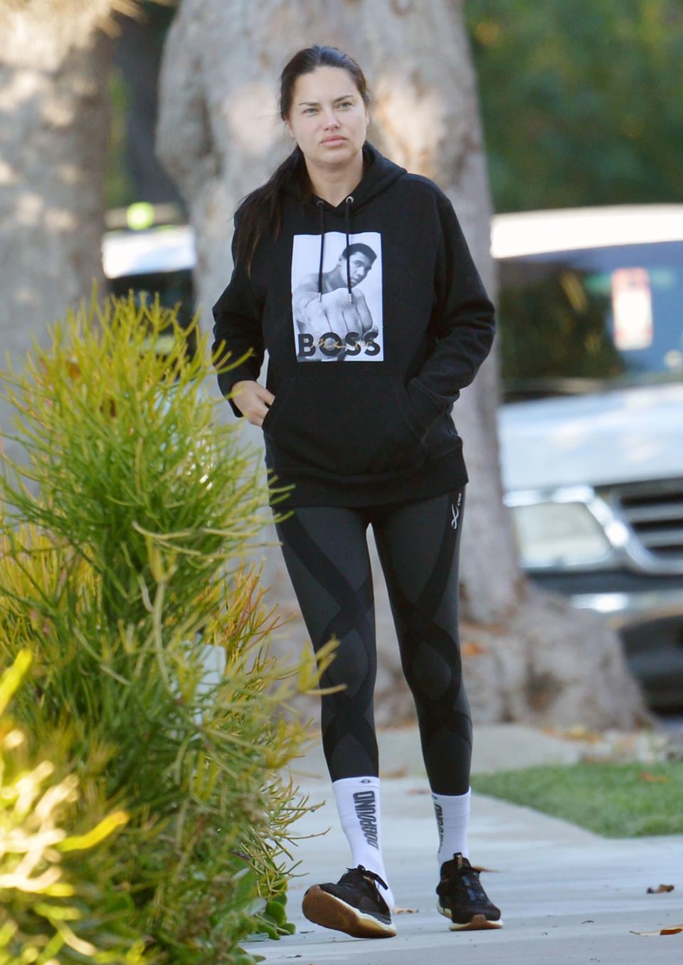 Adriana in sweats outside