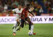 FILE - Spain's Nico Williams, centre, in action during the UEFA Nations League soccer match between Spain and Switzerland, at the Benito Villamarin Stadium, in Seville, Spain, Saturday, Sept. 24, 2022. (AP Photo/Jose Breton, File)