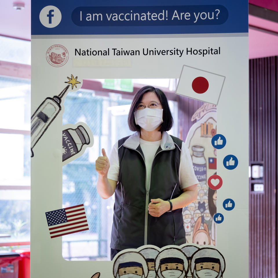 In this photo released by the Taiwan Presidential Office, Taiwanese President Tsai Ing-wen poses for a photo at the Taiwan University Hospital where she received her first shot of the island's first domestically developed coronavirus vaccine made by Medigen Vaccine Biologics Corp. at the in Taipei, Taiwan on Monday, Aug. 23, 2021. The vaccine was given emergency approval by regulators in July using a shortcut that prompted fierce opposition from parts of Taiwan's medical and scientific community. (Taiwan Presidential Office via AP)