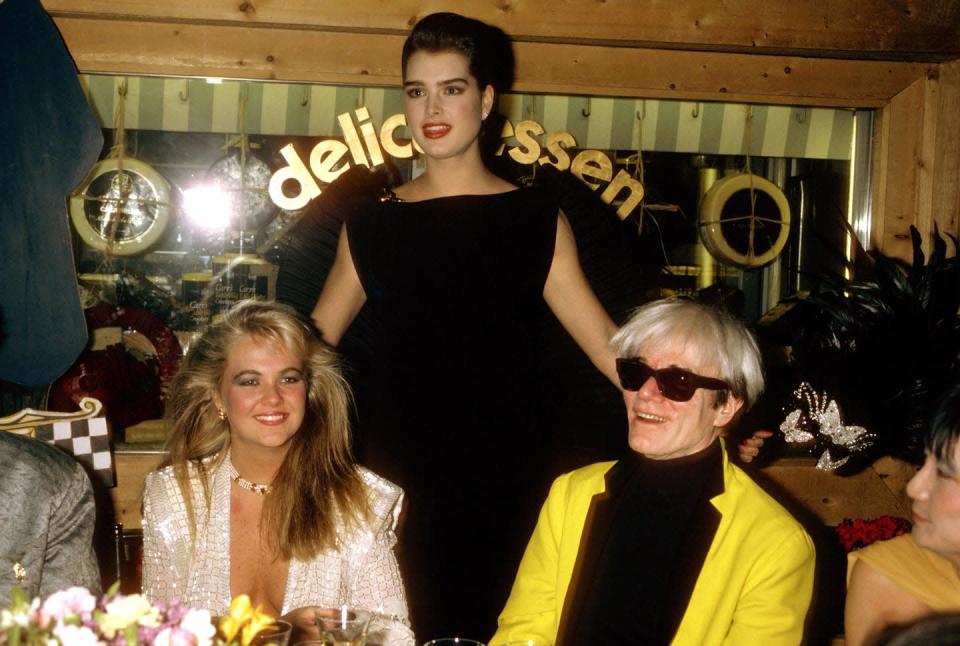<p>With Cornelia Guest and Brooke Shields, the artist attends the launch party for Pierre Cardin's perfume, Maxim's, at Macy's New York flagship location.</p>