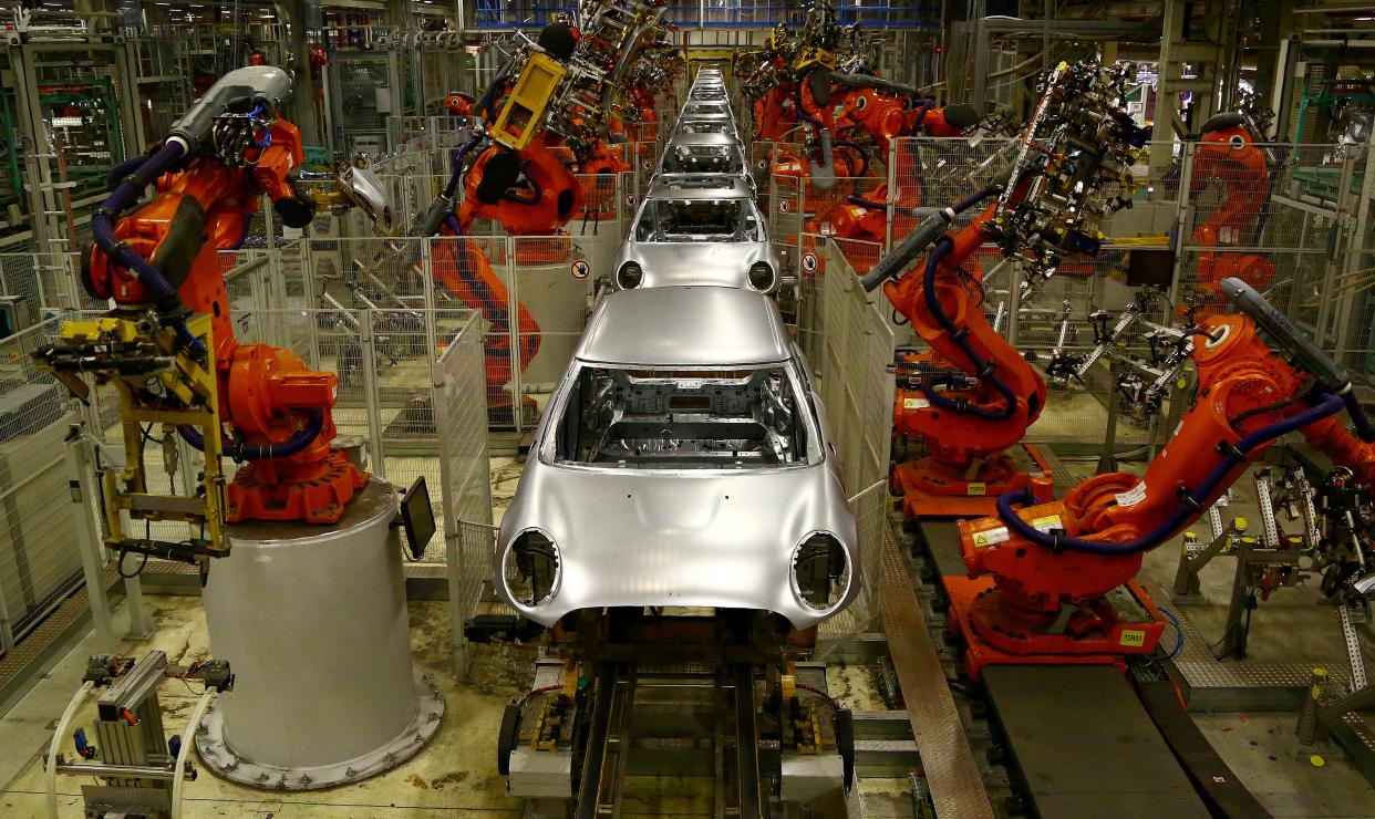 Automated production line at the BMW Mini car production plant in Oxford, England. Photo: Geoff Caddick/AFP/Getty Images