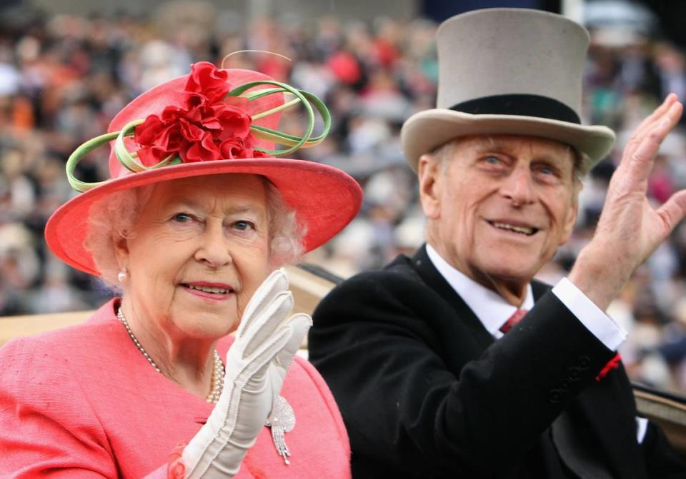 Queen Elizabeth ll and Prince Philip, Duke of Edinburgh, arrive in an open carriage on Ladies Day at Royal Ascot on June 16, 2011, in Ascot, England.