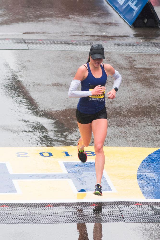 Sarah Sellers crosses the finish line.