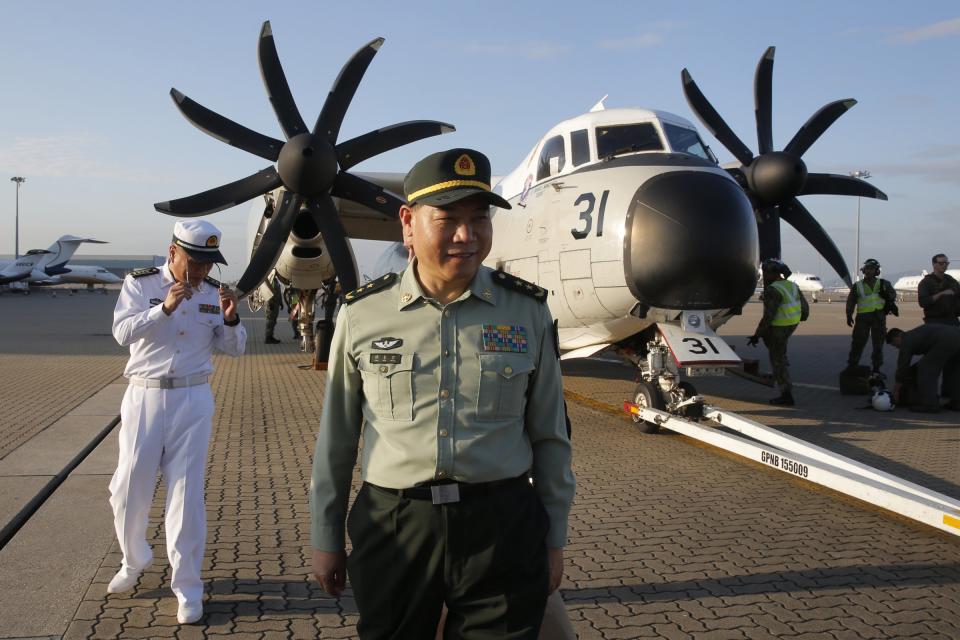 Tan Benhong, a lieutenant general of the People's Liberation Army (PLA) of China, arrives Hong Kong airport after visiting the U.S. Navy USS Ronald Reagan, in Hong Kong, Tuesday, Nov. 20, 2018.