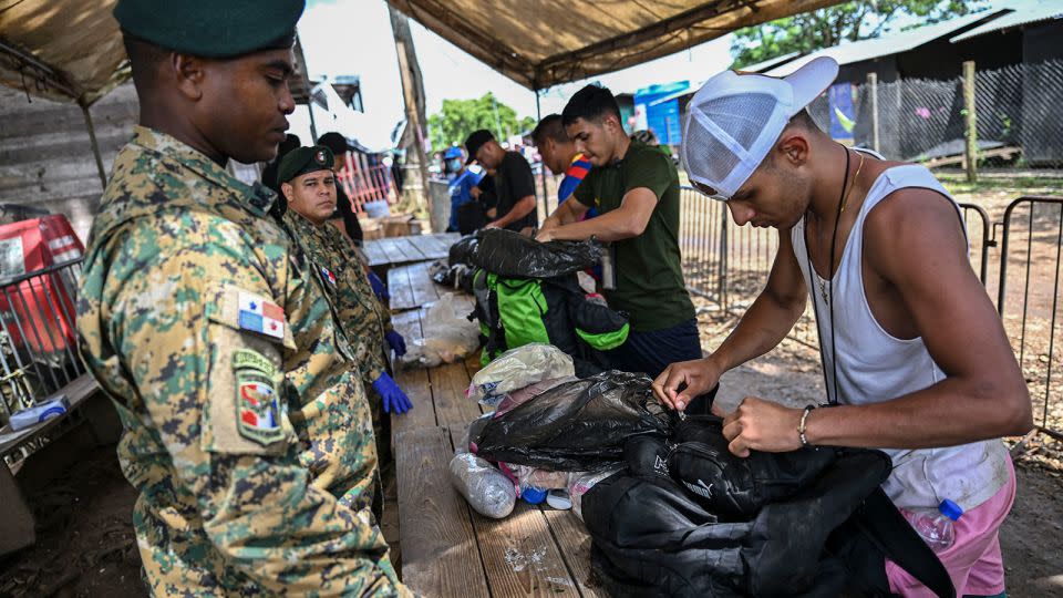 People arrive at the migrant care reception center in Lajas Blancas in the jungle province of Darien, Panama, on June 28, 2024. – Martin Bernetti/AFP/Getty Images/File