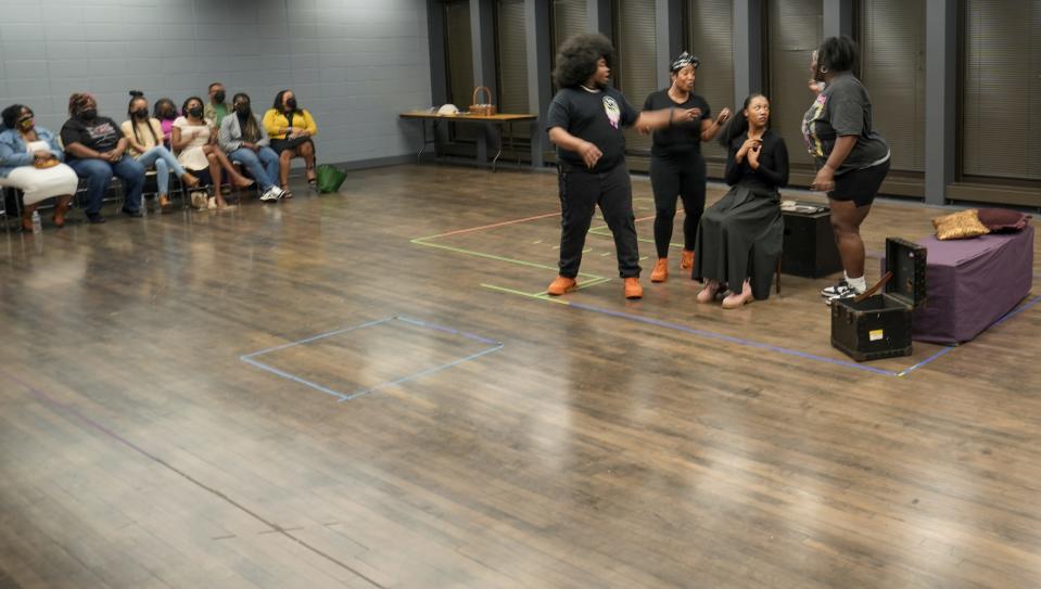 Cast members rehearse a scene from "Zuri's Crown," a new musical adaptation of "Rapunzel" celebrating Black women and their hair.