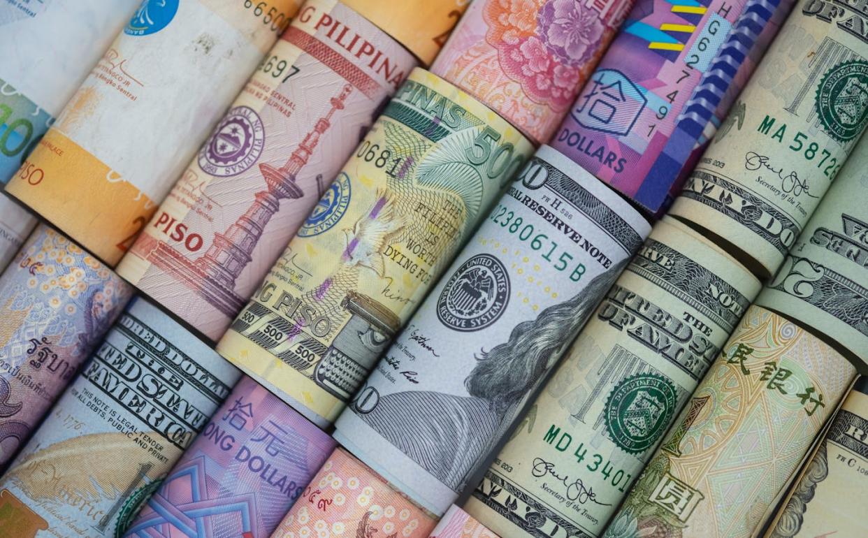 Cash is pretty convenient. <a href="https://www.gettyimages.com/detail/photo/full-frame-shot-of-multi-colored-paper-currencies-royalty-free-image/1189523318?adppopup=true" rel="nofollow noopener" target="_blank" data-ylk="slk:Dilok Klaisataporn/EyeEm via Getty Images;elm:context_link;itc:0;sec:content-canvas" class="link ">Dilok Klaisataporn/EyeEm via Getty Images</a>