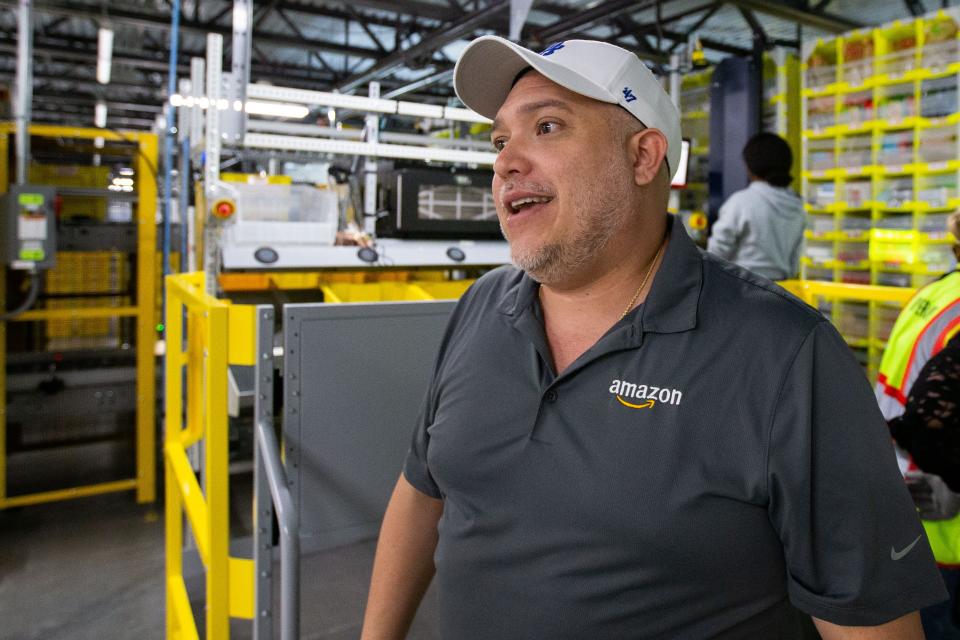 Owen Torres, Amazon public relations manager, shares information about the process a product goes through to arrive at a customer’s doorstep while giving a tour of the Tallahassee Amazon facility on Wednesday, Sept. 13, 2023.