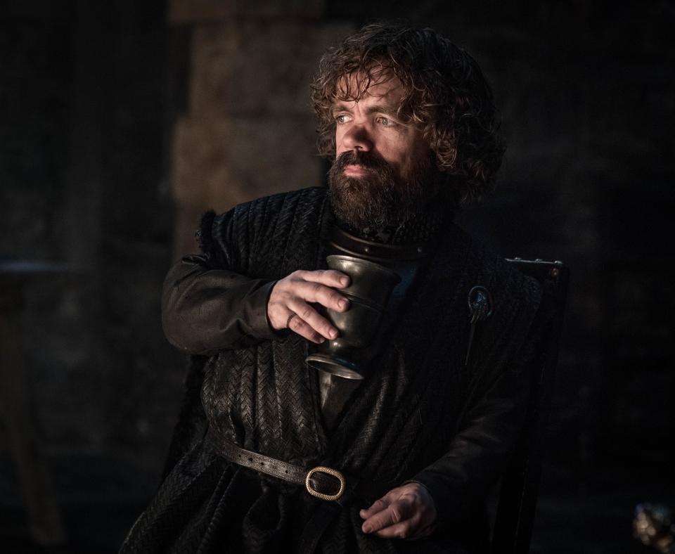 <h1 class="title">Tyrion drinking</h1><cite class="credit">HBO</cite>
