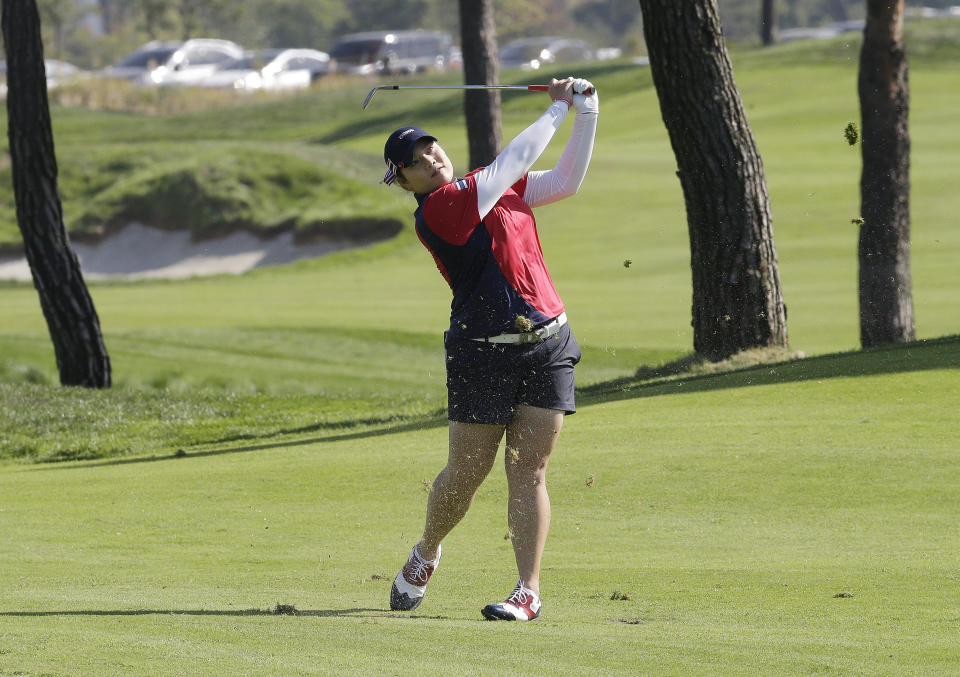 Thailand's Ariya Jutanugarn watches her shot on the first hole during the first round of the UL International Crown golf tournament at the Jack Nicklaus Golf Club Korea in Incheon, South Korea, Thursday, Oct. 4, 2018. (AP Photo/Ahn Young-joon)