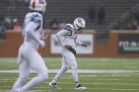 UTSA quarterback Frank Harris walks off the field during the first half of an NCAA college football game against North Texas in Denton, Texas, Saturday, Nov. 27, 2021. (AP Photo/Andy Jacobsohn)