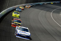 BROOKLYN, MI - JUNE 17: Mark Martin, driver of the #55 Aaron's Dream Machine Toyota, leads Clint Bowyer, driver of the #15 5-hour Energy Toyota, and a group of cars during the NASCAR Sprint Cup Series Quicken Loans 400 at Michigan International Speedway on June 17, 2012 in Brooklyn, Michigan. (Photo by Jared C. Tilton/Getty Images)