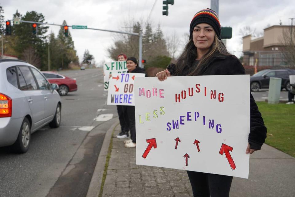 Lily Salas was one of about 15 people who gathered on March 9, 2024, to protest the impending clearing of the encampment behind Walmart in Bellingham, Wash.