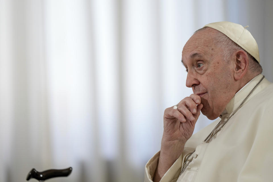 Pope Francis pauses during an interview with The Associated Press at The Vatican, Tuesday, Jan. 24, 2023. Pope Francis said he hasn't even considered issuing norms to regulate future papal resignations and says he plans to continue on for as long as he can as bishop of Rome, despite a wave of attacks against him by some top-ranked cardinals and bishops. (AP Photo/Andrew Medichini)