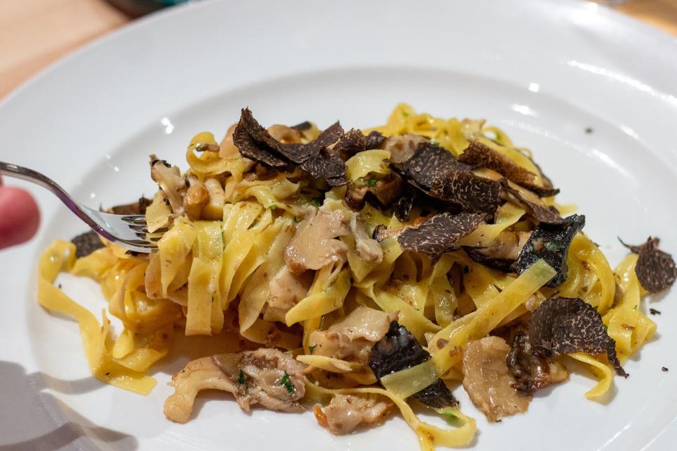 A bowl of tagliatelle with truffles from Nonna Dora's pasta bar in NYC