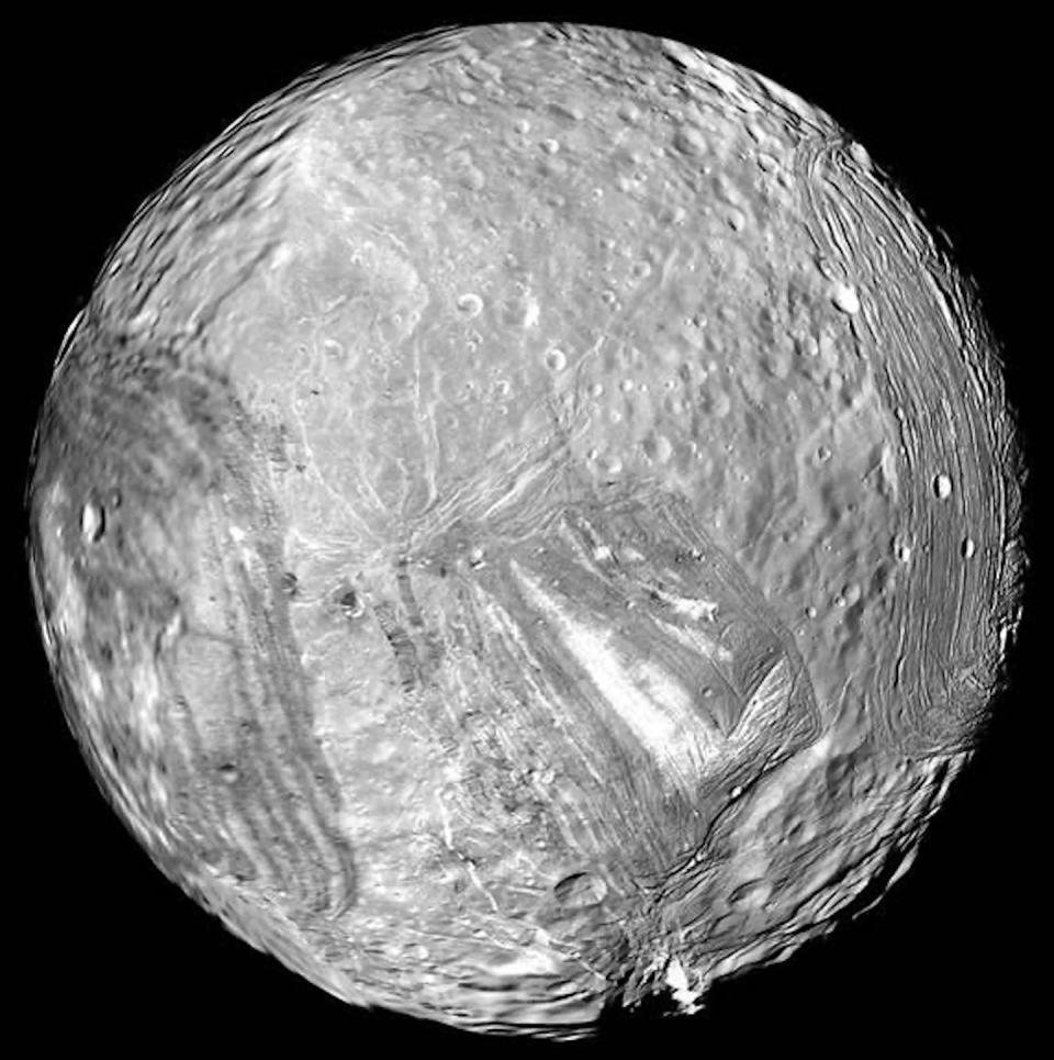 A cratered world of varied landscapes, Miranda is a Uranus moon that might be an ocean world. <a href="https://photojournal.jpl.nasa.gov/catalog/PIA18185" rel="nofollow noopener" target="_blank" data-ylk="slk:NASA/JPL-Caltech;elm:context_link;itc:0;sec:content-canvas" class="link ">NASA/JPL-Caltech</a>