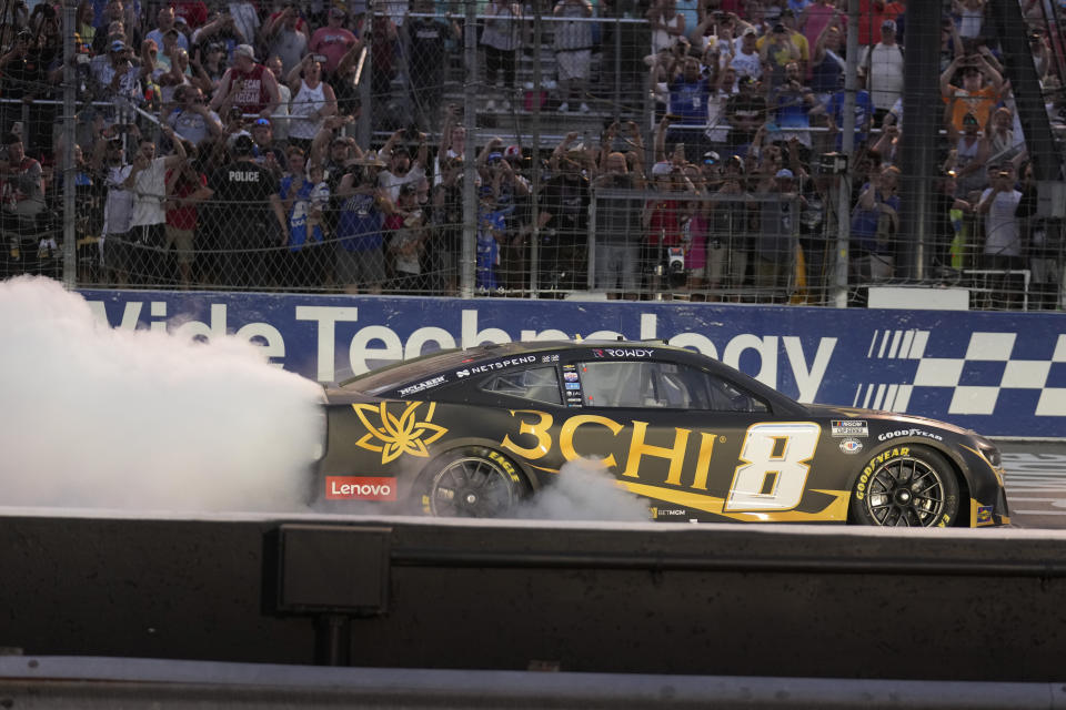 Kyle Busch celebrates after winning a NASCAR Cup Series auto race at World Wide Technology Raceway, Sunday, June 4, 2023, in Madison, Ill. (AP Photo/Jeff Roberson)