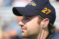 INDIANAPOLIS, IN - MAY 19: James Hinchcliffe the driver of the #27 Team GoDaddy.com Soda car waits to take the track during qualifying for the Indianapolis 500 at Indianapolis Motor Speedway on May 19, 2012 in Indianapolis, Indiana. (Photo by Andy Lyons/Getty Images)