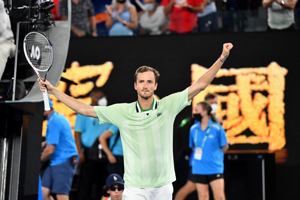 Daniil Medvedev (pictured) thanks the crowd and celebrates after beating Felix Auger-Aliassime at the Australian Open.