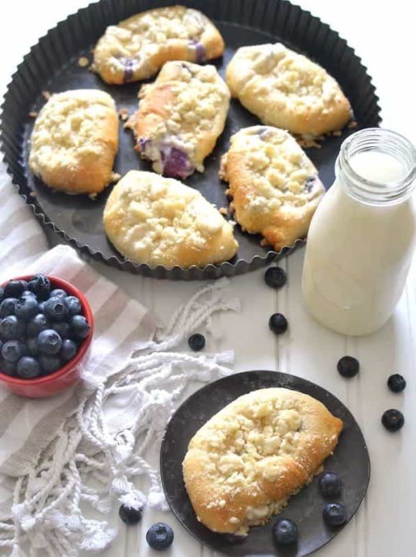 <p>Lemon Tree Dwelling</p><p>These Blueberry Cheesecake Crescent Rolls are stuffed with a sweet cheesecake filling and bursting with fresh blueberries. Add a buttery streusel topping for an extra special breakfast treat!</p><p><strong>Get the recipe: <a href="https://www.lemontreedwelling.com/blueberry-cheesecake-crescent-rolls/" rel="nofollow noopener" target="_blank" data-ylk="slk:Blueberry Cheesecake Crescent Rolls;elm:context_link;itc:0;sec:content-canvas" class="link ">Blueberry Cheesecake Crescent Rolls</a></strong></p><p><strong>Related: <a href="https://parade.com/1041485/kristamarshall/best-blueberry-season-recipes/" rel="nofollow noopener" target="_blank" data-ylk="slk:50 Best Blueberry Recipes;elm:context_link;itc:0;sec:content-canvas" class="link ">50 Best Blueberry Recipes</a></strong></p>