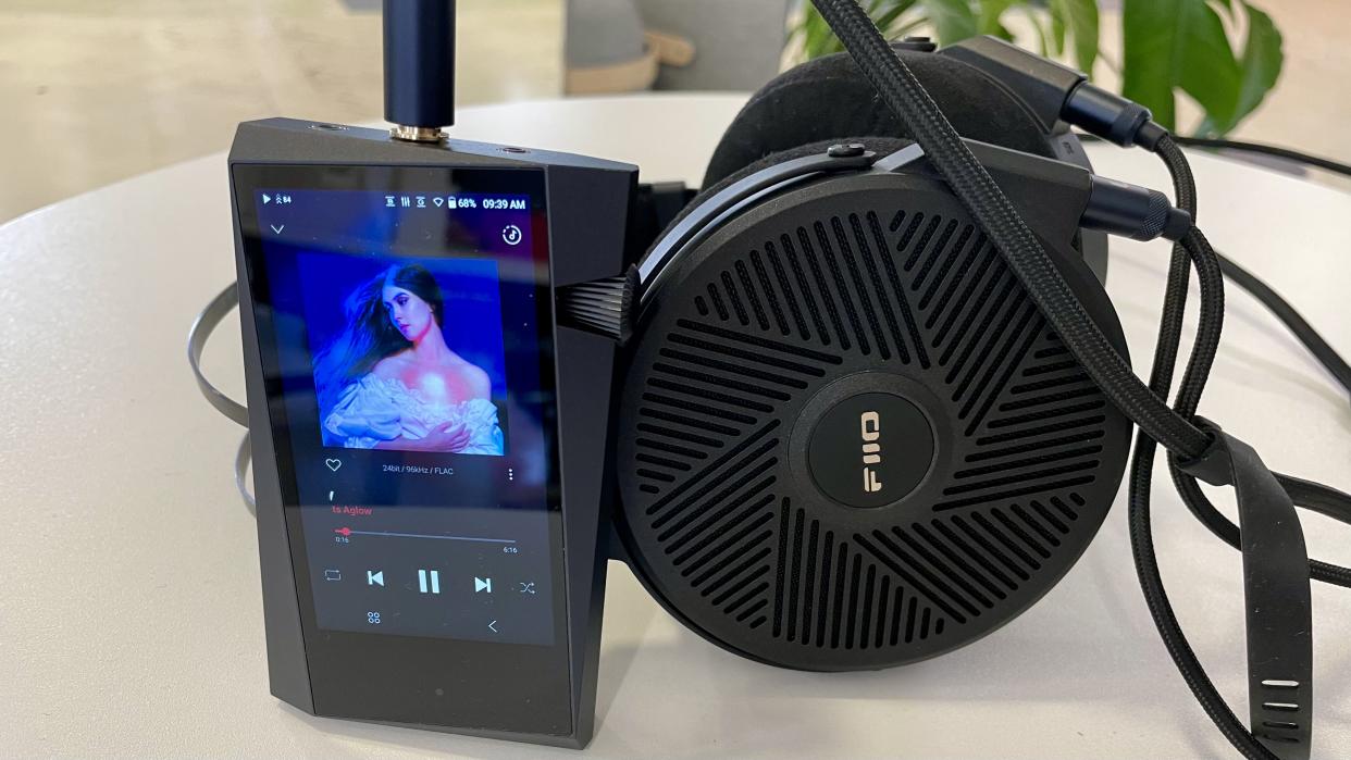  Astell & Kern A&norma SR35 and FiiO FT5 on a table. 