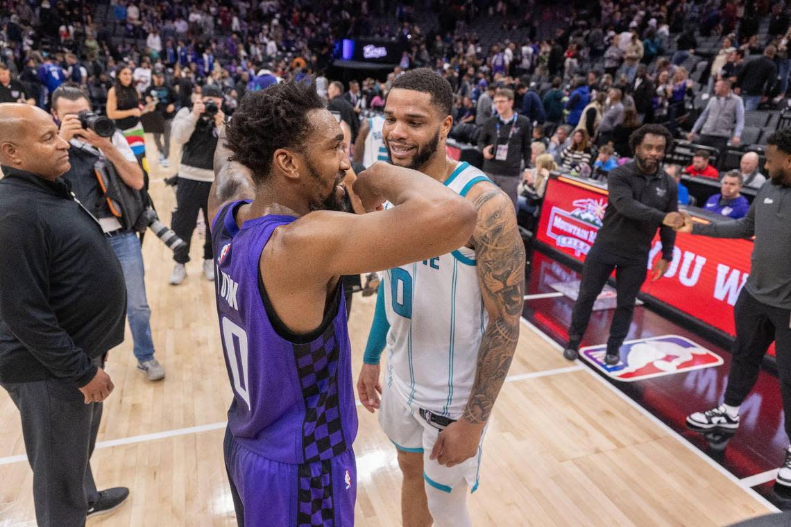 Sacramento Kings guard Malik Monk (0) talks with Charlotte Hornets forward Miles Bridges (0) after an NBA game on Tuesday, Jan., 2, 2024 at Golden 1 Center in Sacramento.