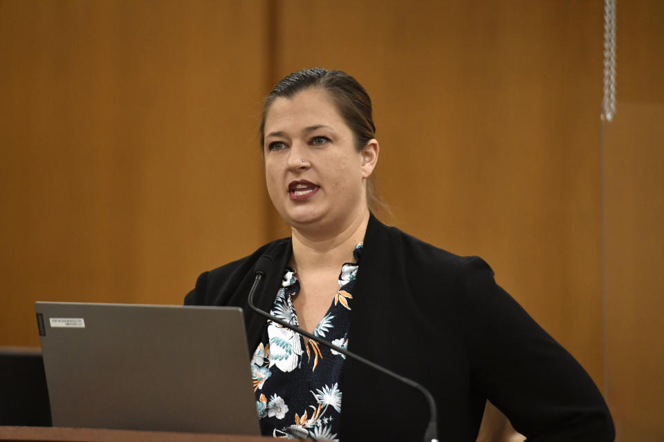 Mackenzie Renner, one of Mark Jensen's attorneys, gives the defense's opening statement during the trial at the Kenosha County Courthouse on Wednesday, Jan. 11, 2023, in Kenosha, Wis. The Wisconsin Supreme Court ruled in 2021 that Jensen deserved a new trial in the 1998 death of his wife Julie Jensen, who was poisoned with antifreeze. (Sean Krajacic/The Kenosha News via AP, Pool)