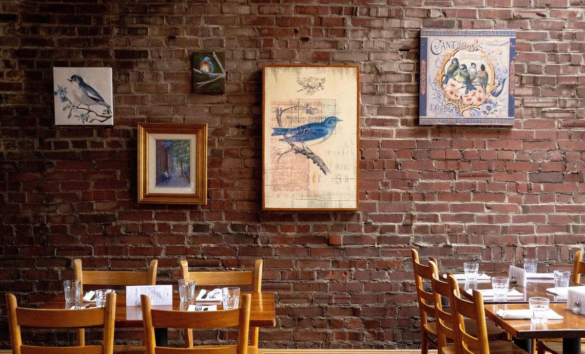 Blue Bird Bistro is a farm-to-table restaurant in Kansas City’s West Side. Multiple bluebird paintings and trinkets are gifts from customers, owner Jane Zieha said. 