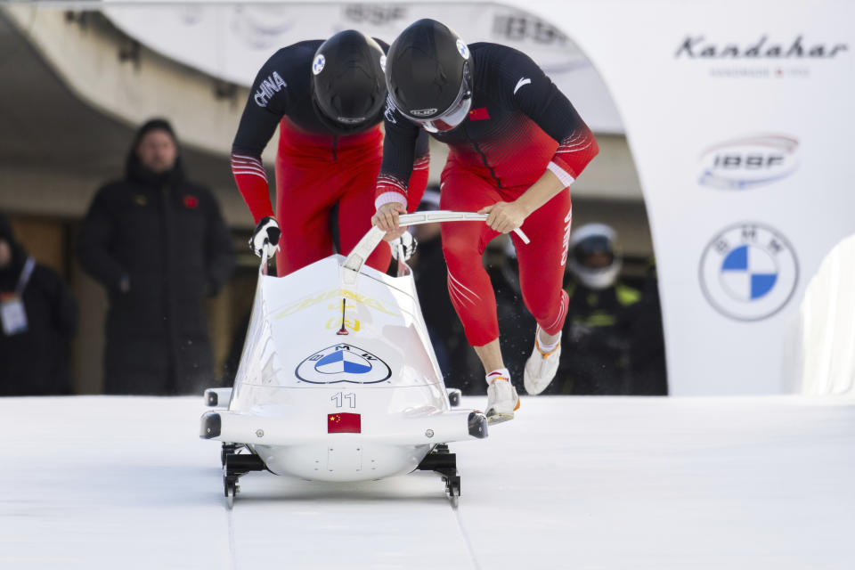 China's Chunjian Li and Qingze Wu start the Two Men's Bob world cup race in St. Moritz, Switzerland, Saturday, Jan. 13, 2024. (Mayk Wendt/Keystone via AP)