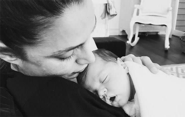 Snez cradles their new baby girl, Willow Wendy Wood, who was named after her father's late mother. Source: Instagram