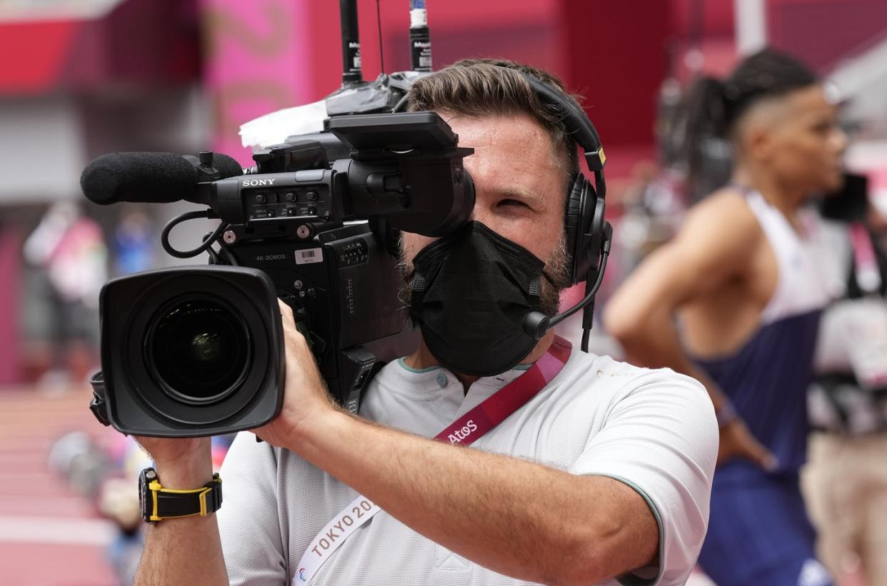 <span class="caption">The cameras at the Olympics supplied video to television broadcasts – and to online streams.</span> <span class="attribution"><a class="link " href="https://newsroom.ap.org/detail/TokyoOlympicsAthletics/44c831ed99094c38bf062d64a23a20fa/photo" rel="nofollow noopener" target="_blank" data-ylk="slk:AP Photo/David J. Phillip;elm:context_link;itc:0;sec:content-canvas">AP Photo/David J. Phillip</a></span>
