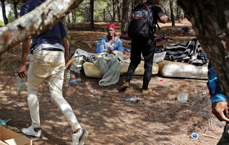 African migrants are seen in a makeshift camp in the Moroccan mountains near the city of Tangier, Morocco September 6, 2018. REUTERS/Youssef Boudlal