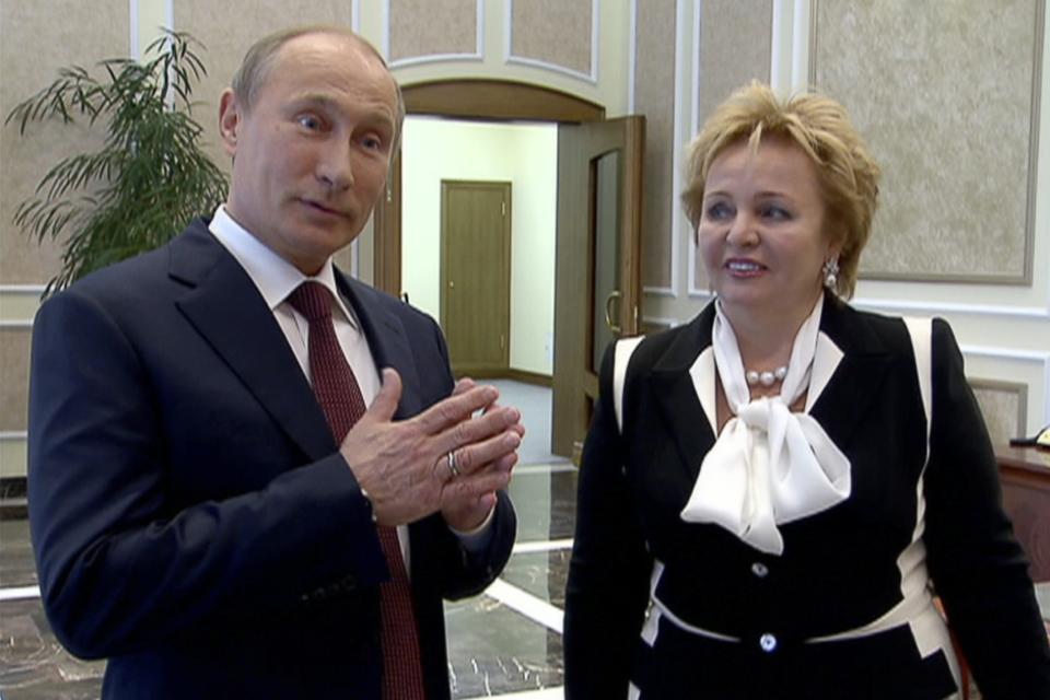 FILE - In this frame grab from video provided by Russia24 TV Channel, June 6, 2013, Russian President Vladimir Putin and his wife, Lyudmila, speak to journalists after attending the ballet "La Esmeralda" in the Kremlin Palace in Moscow. (Russia24 via The Associated Press Television News, File)