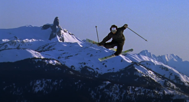 What a shot! Burke goes for the grab with 'The Black Tusk' near Whistler Blackcomb in the background.