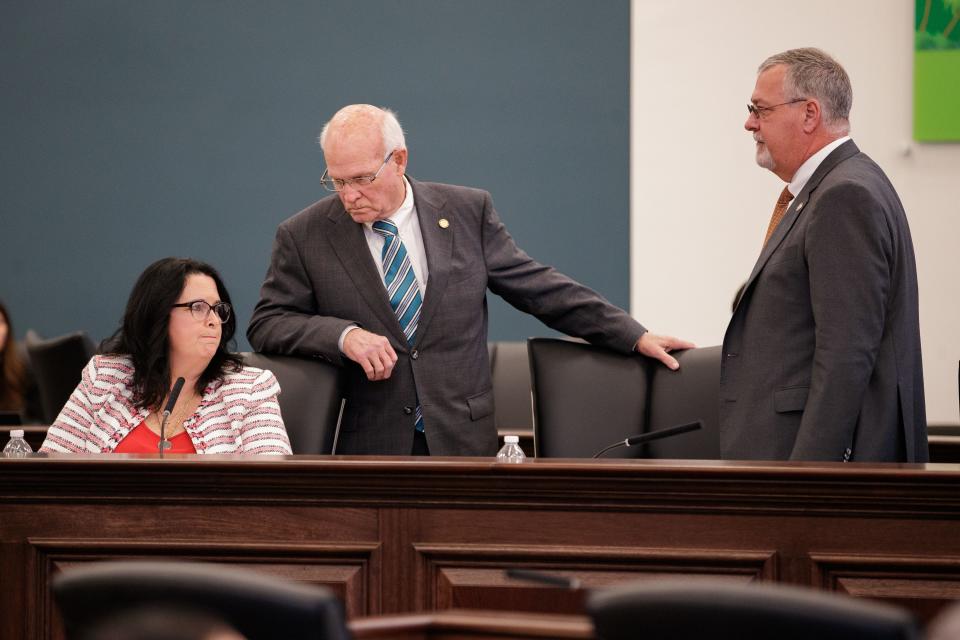 Senators Kelli Stargel, Dennis Baxley and Ben Albritton chat with one another before hearing public comment on SB 146, a proposed abortion bill in the Florida Senate, Wednesday, Feb. 2, 2022.