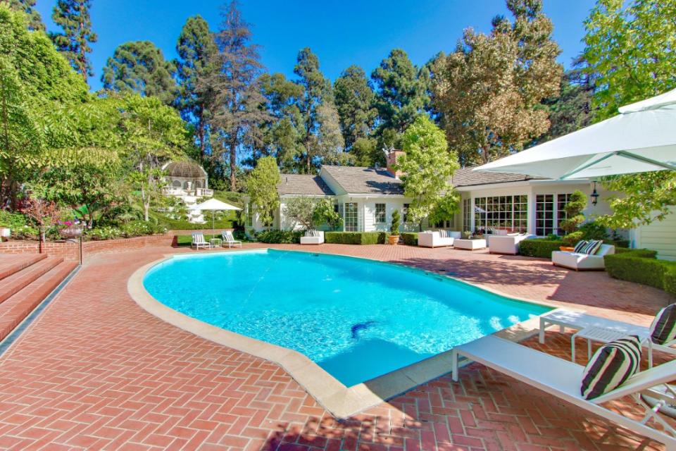 <p>The pool and its patio space are perfect for entertaining. (Sotheby’s International Realty) </p>