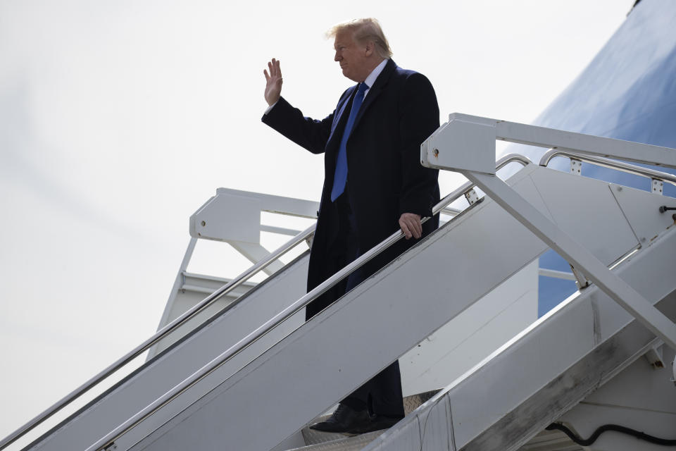 President Donald Trump arrives at Dobbins Air Reserve Base to attend a fundraiser and speak at the launch of "Black Voices for Trump," Friday, Nov. 8, 2019, in Marietta, Ga. (AP Photo/ Evan Vucci)