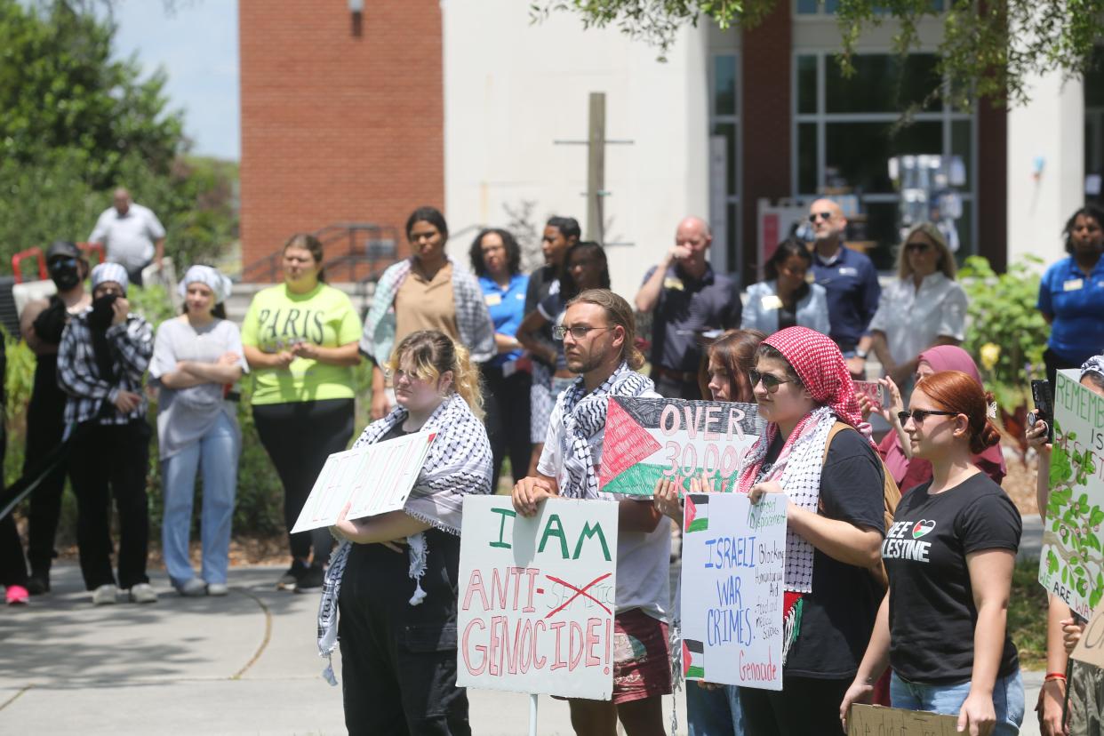 Onlookers gather during a pro-Palestinian rally on Thursday, May 2, 2024 at the Georgia Southern University Armstrong campus in Savannah.