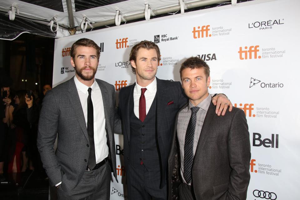 Actor brothers Liam Hemsworth (l-r), Chris Hemsworth and Luke Hemsworth (Hubert Boesl/dpa/Alamy/PA)