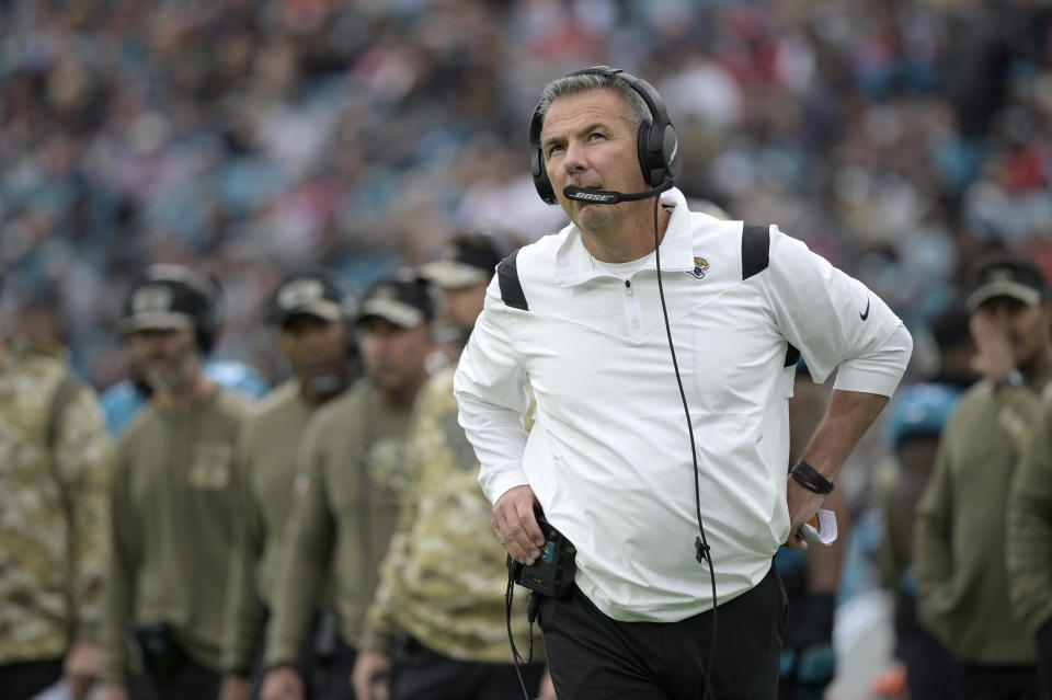 FILE - Jacksonville Jaguars head coach Urban Meyer watches from the sideline during the first half of an NFL football game against the Atlanta Falcons, Sunday, Nov. 28, 2021, in Jacksonville, Fla. Just 13 games into his tenure, Meyer was mercifully fired by the Jacksonville Jaguars. With Meyer out of the running for coach of the year, and no idea where Bobby Petrino ended up, we'll give this Newby trophy to Ted Lasso. (AP Photo/Phelan M. Ebenhack, File)