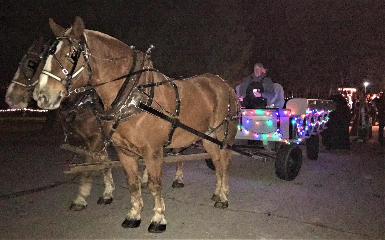 FILE - Horse-drawn wagon rides are always among the favorite activities at Christmas at Sinawa.