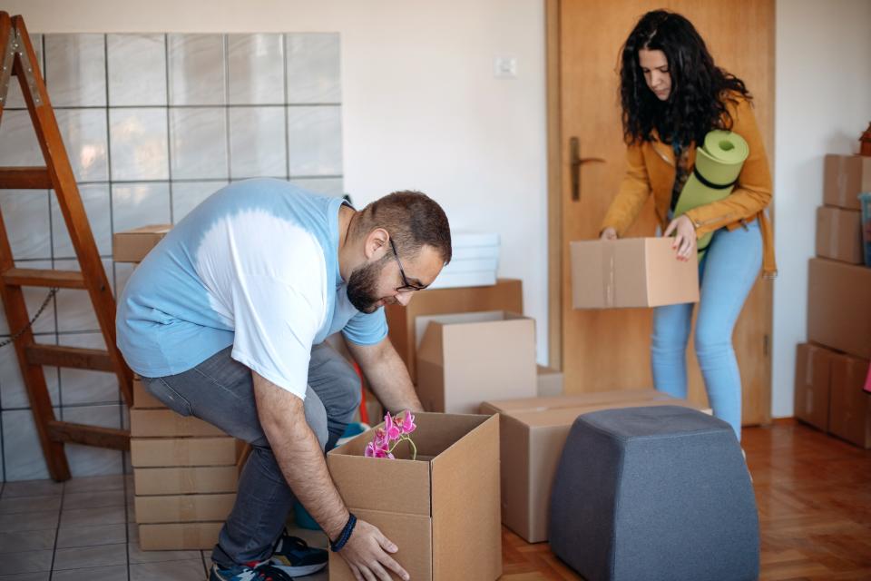 New homeowners moving into their property.