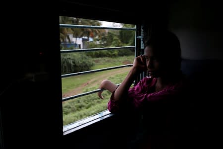 The Wider Image: The Indian children who take a train to collect water